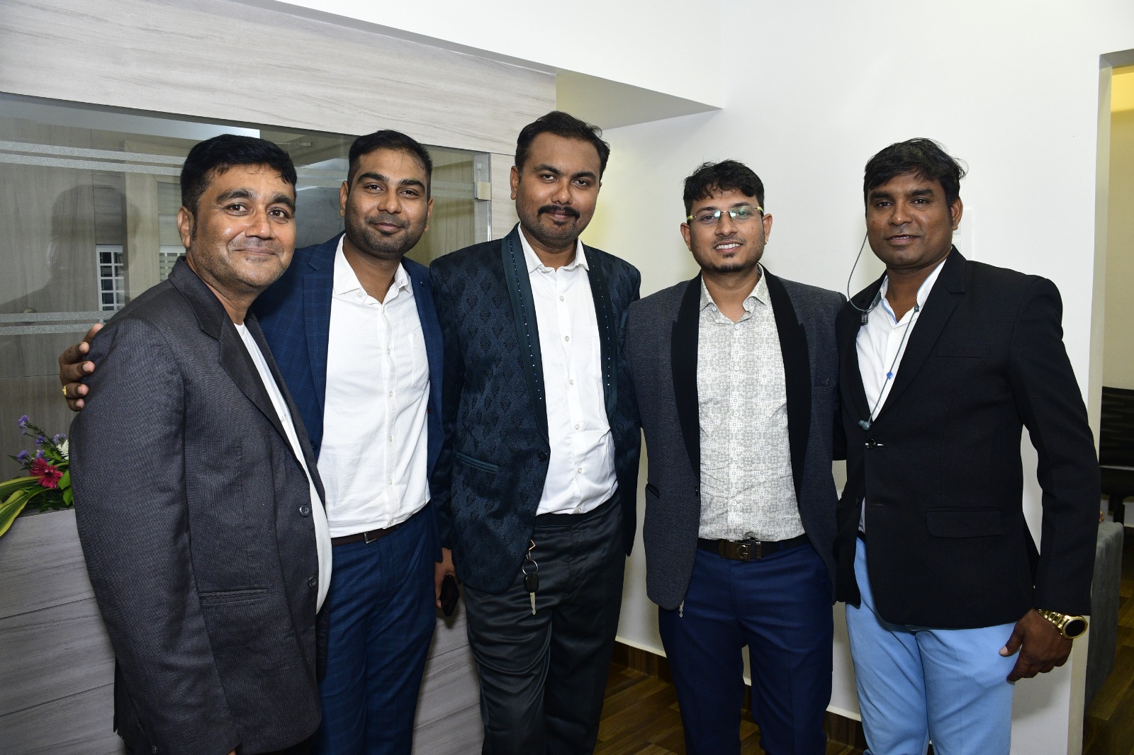 Management team of Tirumauli Developers posing at office