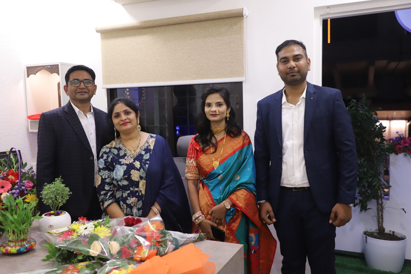 Guests and team members at Tirumauli Developers office event